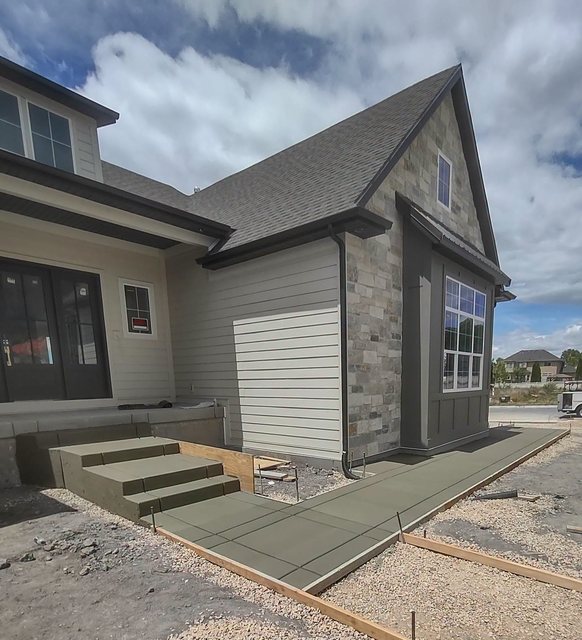 Poured concrete steps and porch at a Wasatch Front home